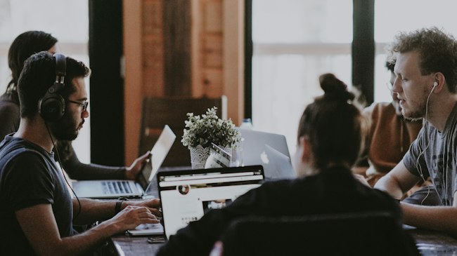 A person working alone at a desk, the reality of building without outside capital