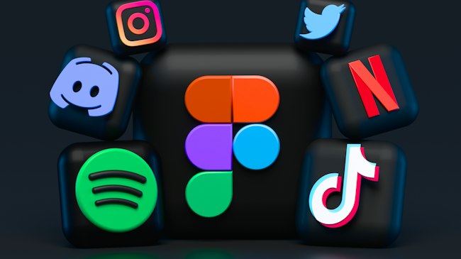 A smartphone displaying a grid of social media app icons, representing the creator economy